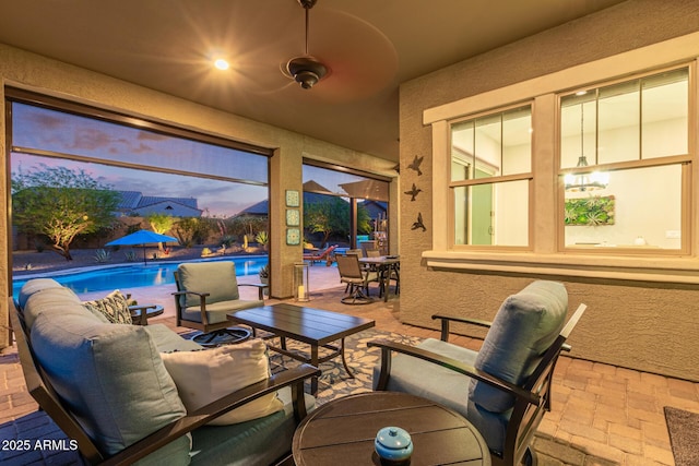 4876 N 207th Ln, Buckeye, AZ 85396 - view of patio featuring outdoor dining area, outdoor lounge area, and an outdoor pool