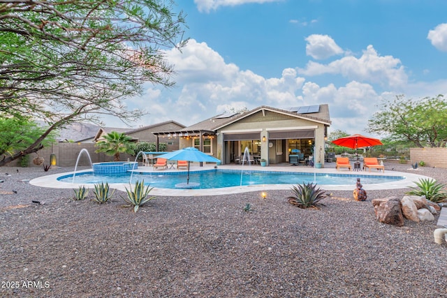 4876 N 207th Ln, Buckeye, AZ 85396 - outdoor pool with outdoor dining space, a fenced backyard, and a patio area