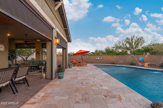 4876 N 207th Ln, Buckeye, AZ 85396 - view of swimming pool featuring outdoor lounge area, a patio, and a fenced backyard