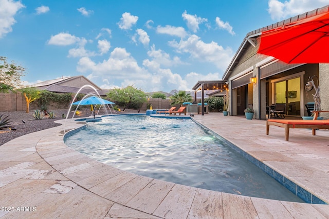4876 N 207th Ln, Buckeye, AZ 85396 - view of swimming pool featuring a fenced in pool, a patio, and a fenced backyard