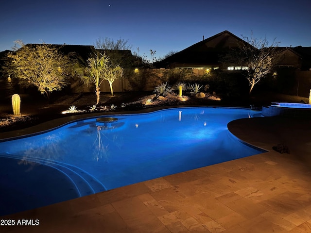 4876 N 207th Ln, Buckeye, AZ 85396 - view of swimming pool with a patio, a fenced backyard, and a pool with connected hot tub