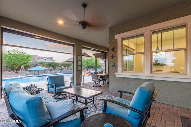 4876 N 207th Ln, Buckeye, AZ 85396 - view of patio with an outdoor living space, an outdoor pool, and outdoor dining space