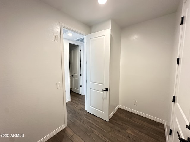 6947 W Spur Dr, Peoria, AZ 85383 - hall featuring baseboards, dark wood-type flooring, and recessed lighting