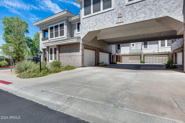 exterior space with a garage