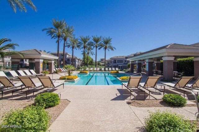 view of swimming pool with a patio area and a gazebo