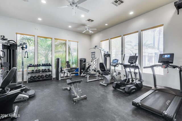 exercise room with ceiling fan