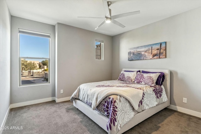 bedroom with ceiling fan and carpet