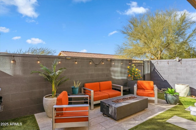 view of patio with an outdoor fire pit