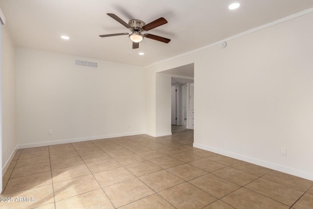 empty room with a ceiling fan, recessed lighting, visible vents, and baseboards