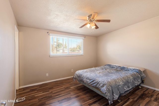 4565 Aspen Dr, Sierra Vista, AZ 85635 - bedroom featuring ceiling fan, dark hardwood / wood-style floors, and a textured ceiling