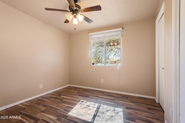 4565 Aspen Dr, Sierra Vista, AZ 85635 - unfurnished bedroom featuring ceiling fan, a closet, and dark hardwood / wood-style flooring