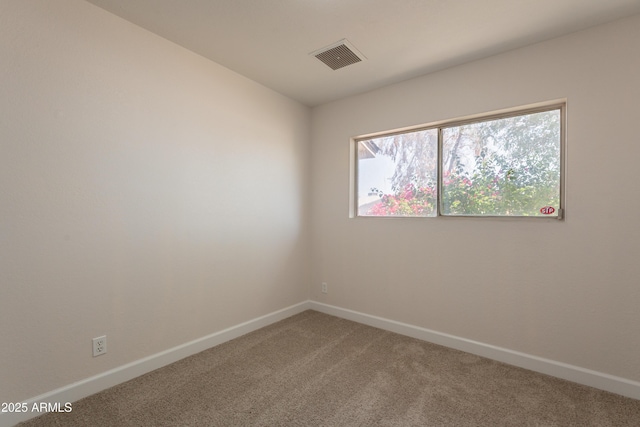 1310 E Ironwood Dr, Buckeye, AZ 85326 - carpeted empty room featuring baseboards