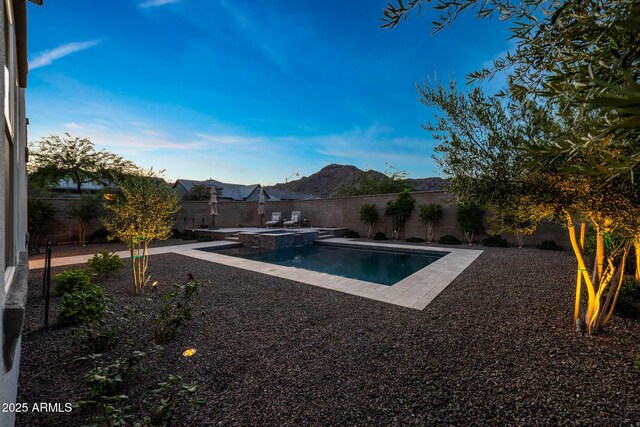 21194 W Hillcrest Blvd, Buckeye, AZ 85396 - view of swimming pool featuring a fenced backyard, an in-ground hot tub, and a patio