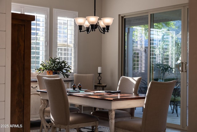 21194 W Hillcrest Blvd, Buckeye, AZ 85396 - dining space with a chandelier and healthy amount of natural light