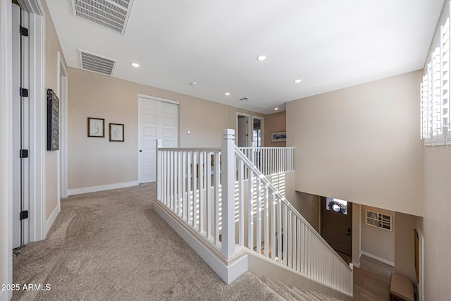 21194 W Hillcrest Blvd, Buckeye, AZ 85396 - hallway featuring an upstairs landing, baseboards, recessed lighting, and carpet