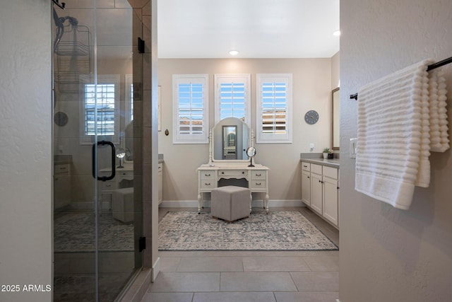 21194 W Hillcrest Blvd, Buckeye, AZ 85396 - full bathroom featuring vanity, a shower stall, tile patterned floors, baseboards, and recessed lighting