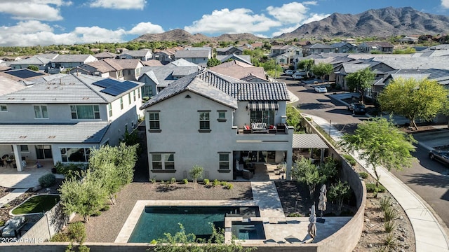 21194 W Hillcrest Blvd, Buckeye, AZ 85396 - aerial perspective of suburban area with a mountain backdrop