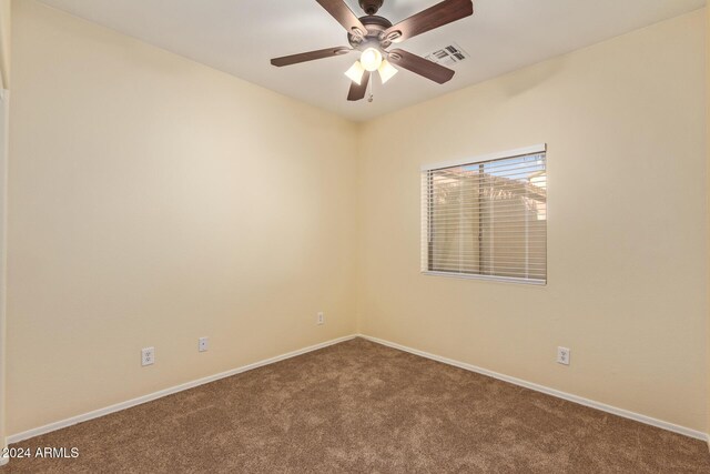 6321 S Teresa Dr, Chandler, AZ 85249 - spare room with carpet, baseboards, and a ceiling fan