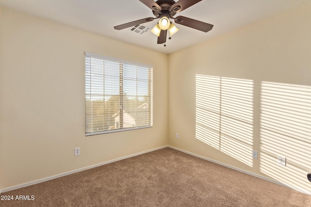 6321 S Teresa Dr, Chandler, AZ 85249 - spare room featuring carpet, baseboards, and ceiling fan