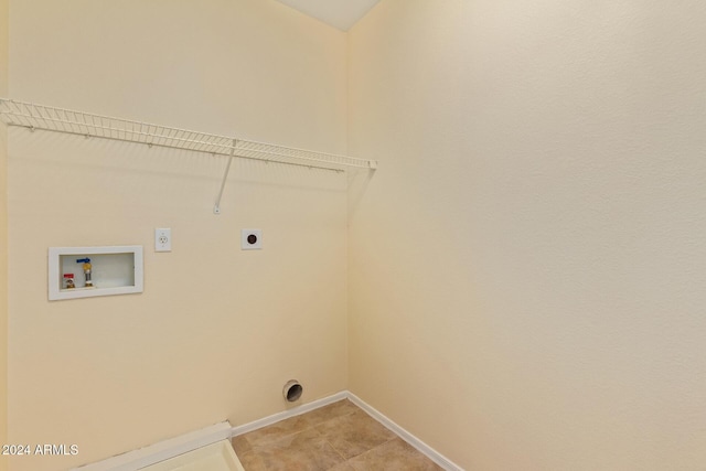 6321 S Teresa Dr, Chandler, AZ 85249 - laundry room with hookup for an electric dryer, hookup for a washing machine, baseboards, and light tile patterned flooring