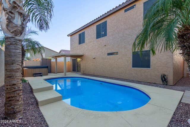 6321 S Teresa Dr, Chandler, AZ 85249 - view of swimming pool with a hot tub, a patio area, and a fenced backyard