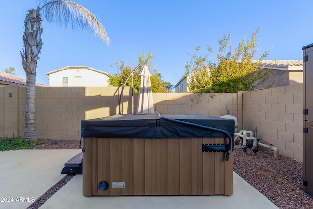 6321 S Teresa Dr, Chandler, AZ 85249 - fenced backyard featuring a hot tub and a patio