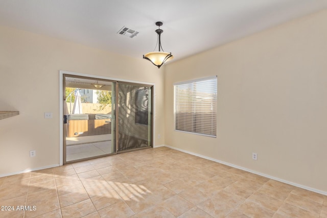 6321 S Teresa Dr, Chandler, AZ 85249 - spare room featuring light tile patterned flooring and baseboards