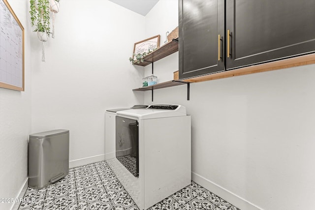 141 S 156th Dr, Goodyear, AZ 85338 - washroom with cabinet space, baseboards, and separate washer and dryer