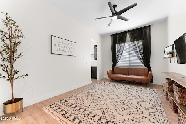 141 S 156th Dr, Goodyear, AZ 85338 - sitting room featuring light wood finished floors, baseboards, and a ceiling fan