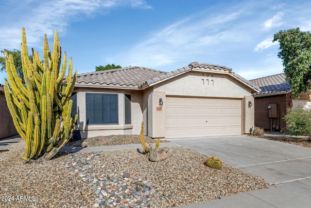 view of front of home with a garage