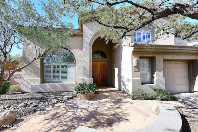 property entrance featuring a garage