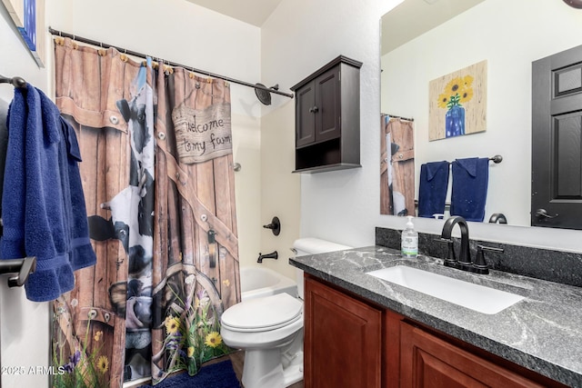 full bathroom with shower / bath combo, toilet, and vanity