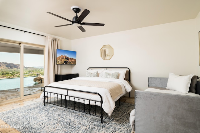 4636 E Moonlight Way, Paradise Valley, AZ 85253 - bedroom featuring access to exterior and a ceiling fan