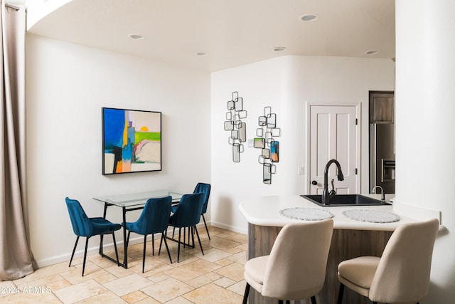 4636 E Moonlight Way, Paradise Valley, AZ 85253 - dining room featuring stone tile floors, recessed lighting, and baseboards