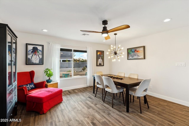 dining area with dark wood-style floors, recessed lighting, visible vents, and baseboards