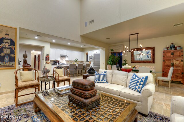 living room featuring a chandelier