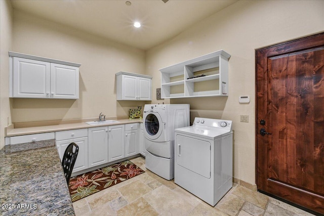 2744 S First Water Ln, Gold Canyon, AZ 85118 - laundry room with a sink, cabinet space, stone tile floors, and washer and dryer