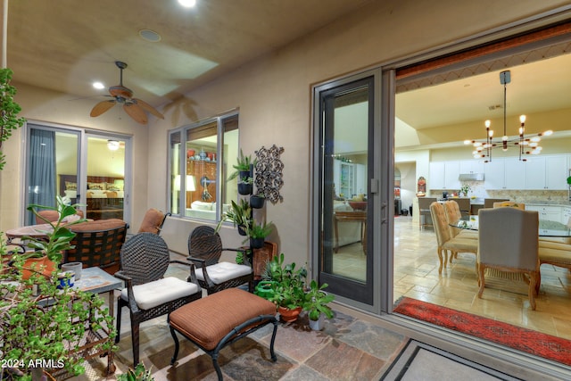 view of patio featuring ceiling fan