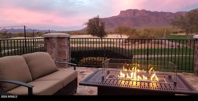 2744 S First Water Ln, Gold Canyon, AZ 85118 - exterior space with a mountain view and an outdoor living space with a fire pit