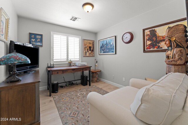 living area featuring light hardwood / wood-style floors