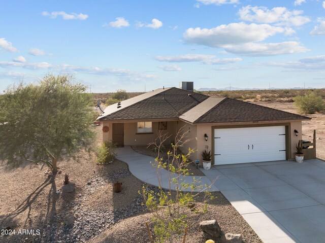 view of front of home with a garage