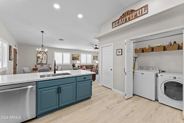 kitchen with blue cabinetry, sink, stainless steel dishwasher, ceiling fan with notable chandelier, and light wood-type flooring