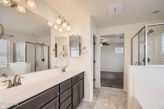 bathroom featuring ceiling fan, tile patterned floors, walk in shower, and vanity