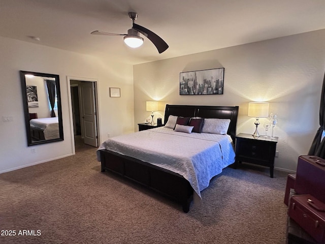 bedroom featuring dark colored carpet and ceiling fan