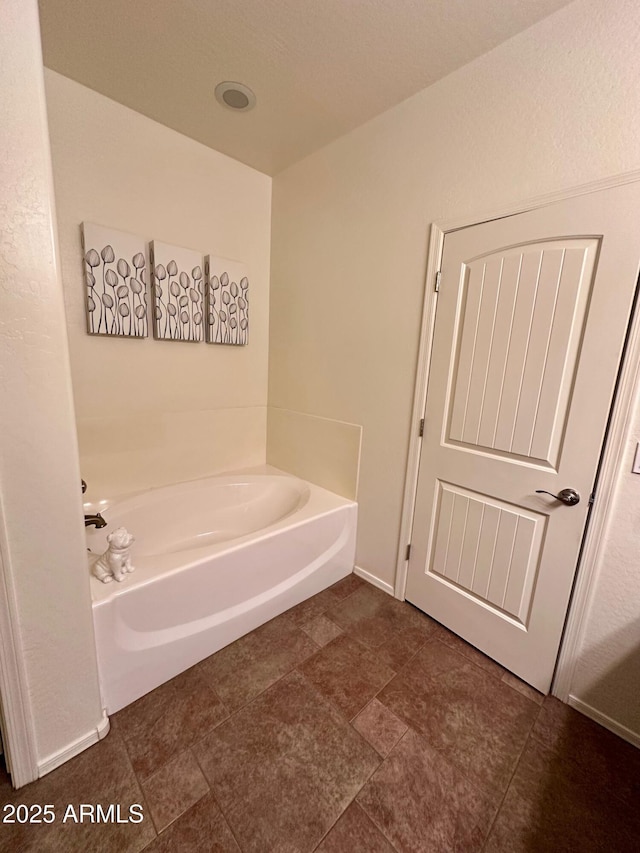 bathroom featuring a tub