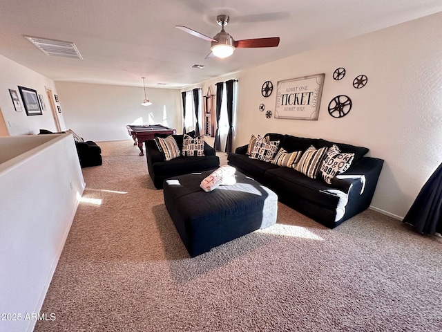 living room featuring carpet floors, ceiling fan, and billiards