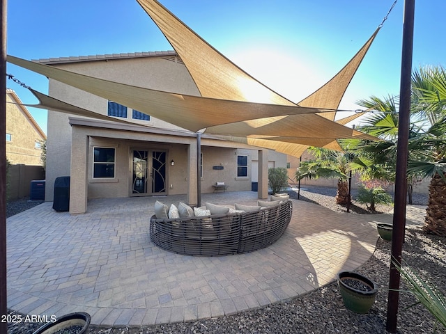 view of patio with an outdoor hangout area and central air condition unit