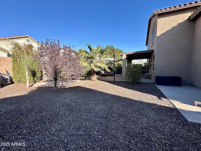 view of yard with a patio area