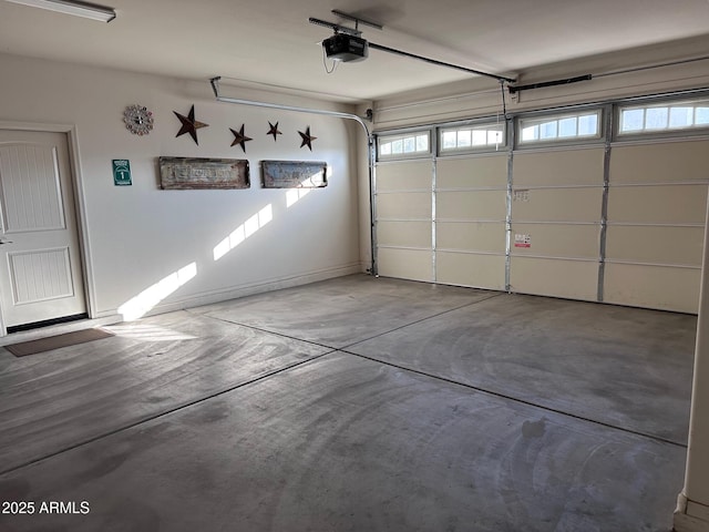 garage featuring a garage door opener