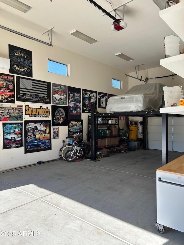 garage featuring a garage door opener